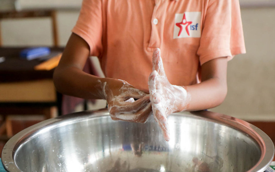 ISF student washing their hands
